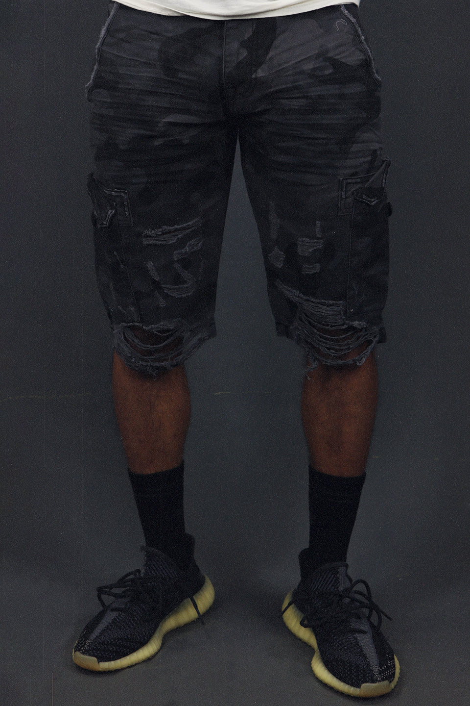 front shot of the Men's Ripped Black Camo Vintage Distressed Cargo Shorts | Black