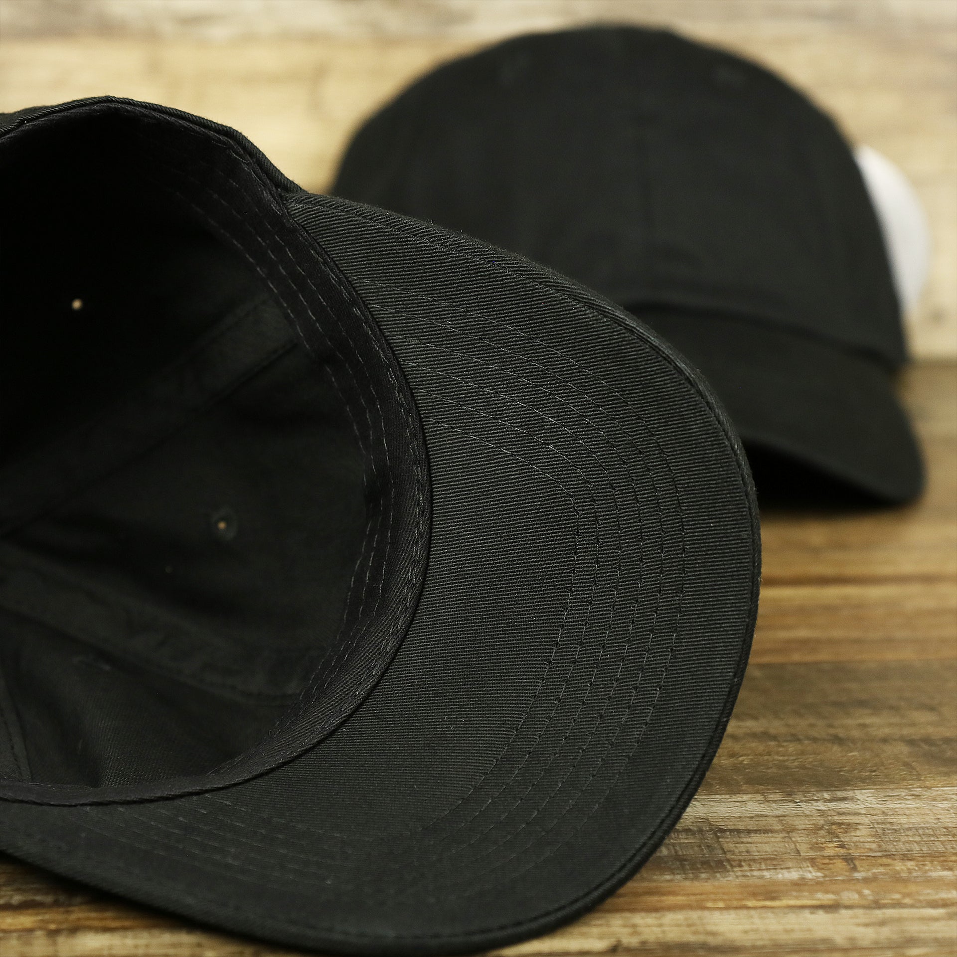 The undervisor on the Jet Black Blank Baseball Hat | Black Dad Hat