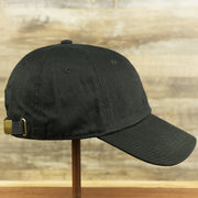 The wearer's right on the Jet Black Blank Baseball Hat | Black Dad Hat