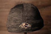 The backside of this ravens hat has the ravens logo Ravens 2020 Training Camp Flexfit | Baltimore Ravens 2020 On-Field Grey Training Camp Stretch Fit
