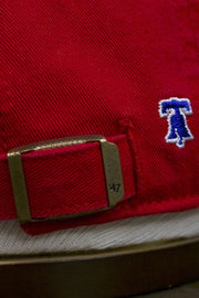 adjustable strap on the Philadelphia Phillies All Over Bell Confetti Red Women's Dad Hat