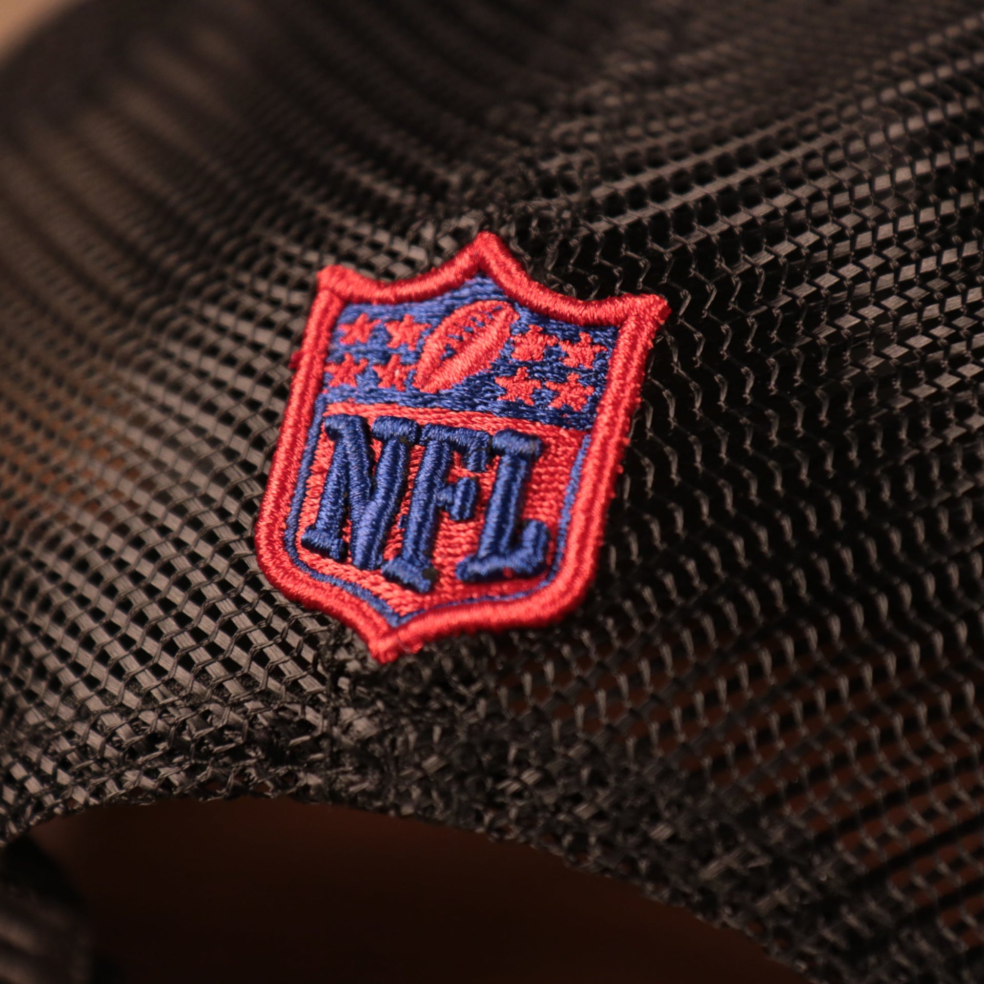 The NFL logo on the back of the New York Giants official 20201 NFL draft hat.