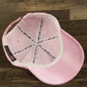 The inside of the Satin Blank Cherry Blossom Pink Baseball Hat | Light Pink Dad Hat