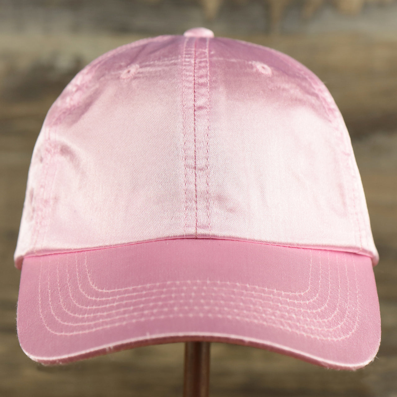 The front of the Satin Blank Cherry Blossom Pink Baseball Hat | Light Pink Dad Hat