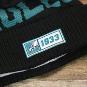 The Rubber Eagles 1933 Patch on the Philadelphia Eagles On Field Since 1933 Eagles Patch Winter Pom Pom Beanie | Black Winter Beanie