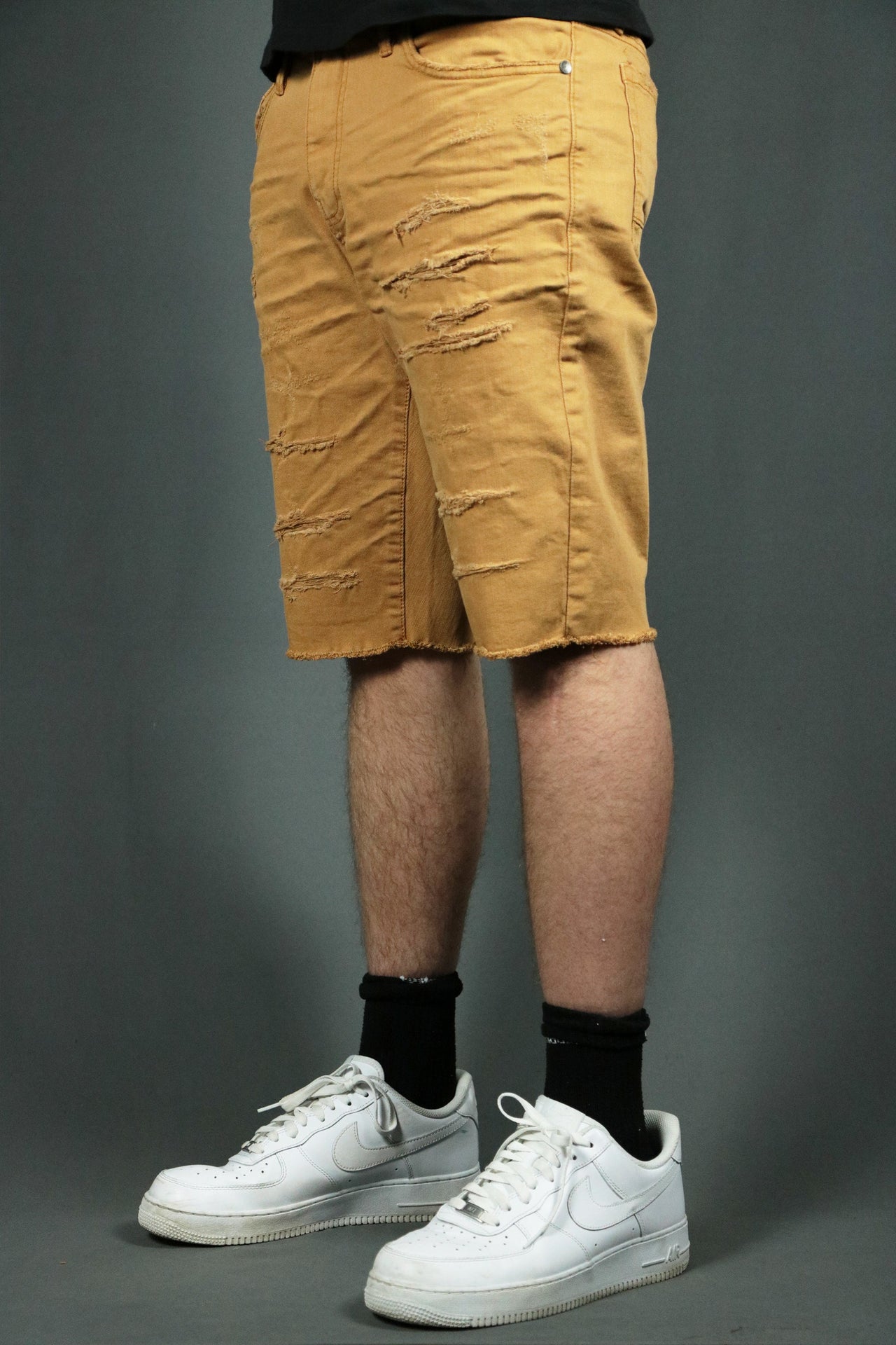 The khaki ripped men shorts by Jordan Craig.