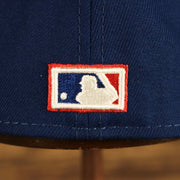 Close up of the Cooperstown Batterman logo on the back of the Toronto Blue Jays "City Cluster" Side Patch Gray Bottom Royal 59Fifty Fitted Cap