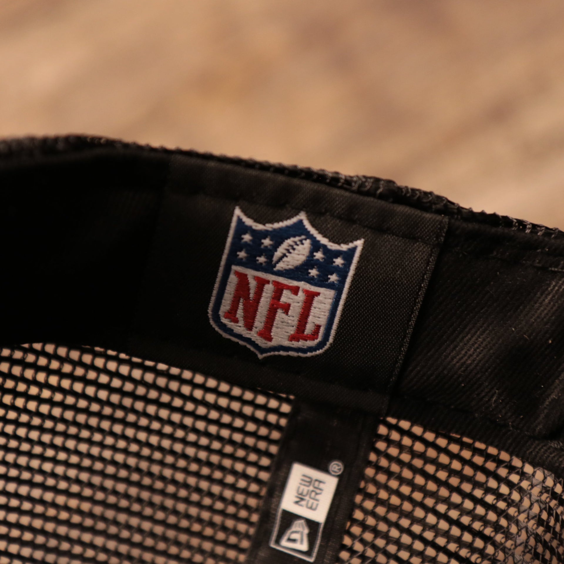 The NFL logo on the inside of the Philadelphia Eagles 2021 NFL draft cap.