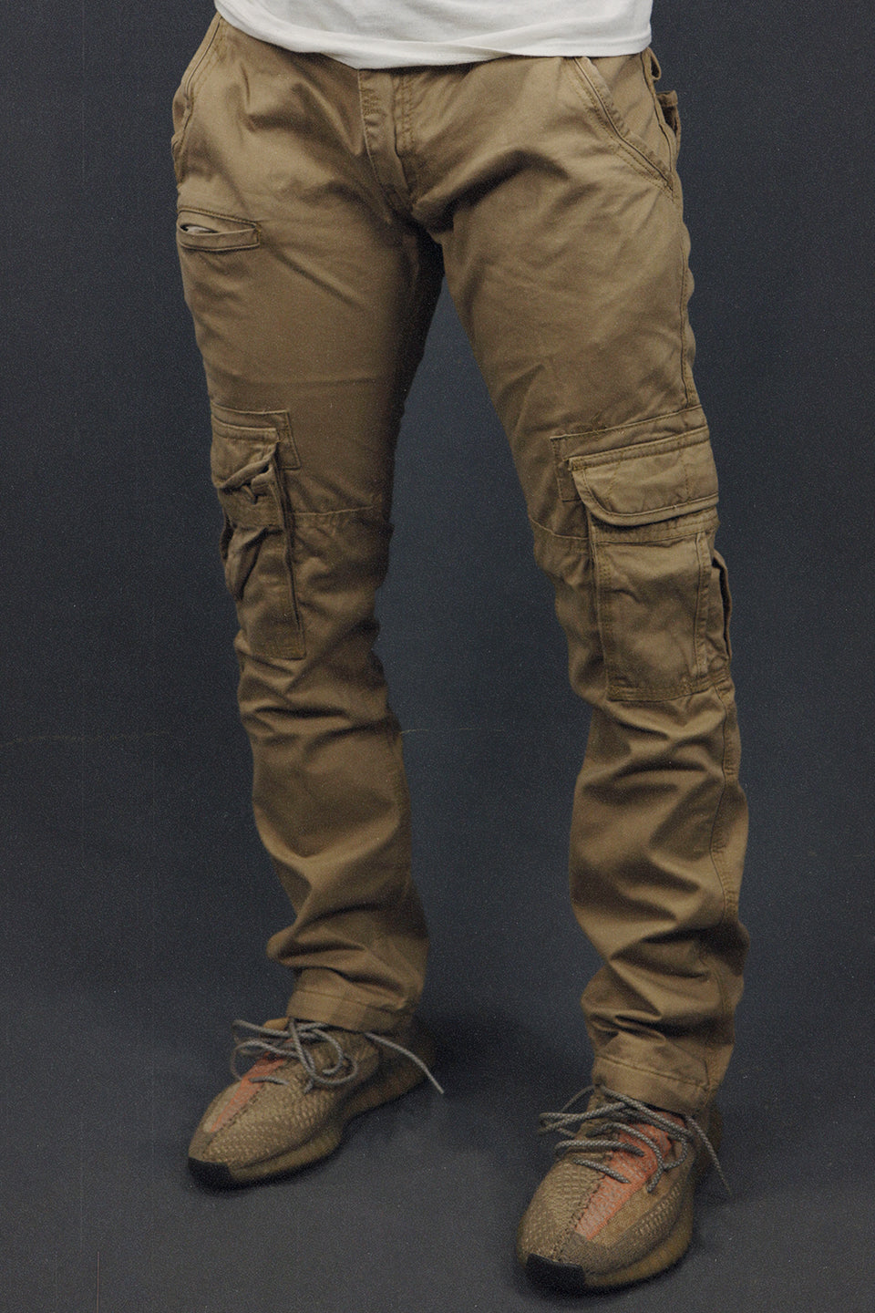 front of the Men's Khaki Combat Pants Six Pocket Cargo Pants To Match Sneakers | Khaki