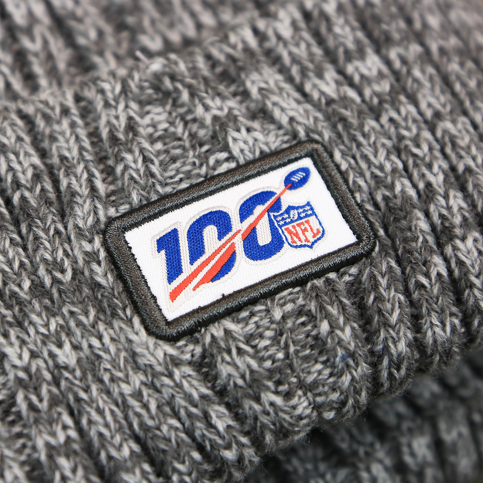 The NFL 100 Logo on the Philadelphia Eagles On Field Crucial Catch Patch NFL Winter Beanie | Graphite Winter Beanie
