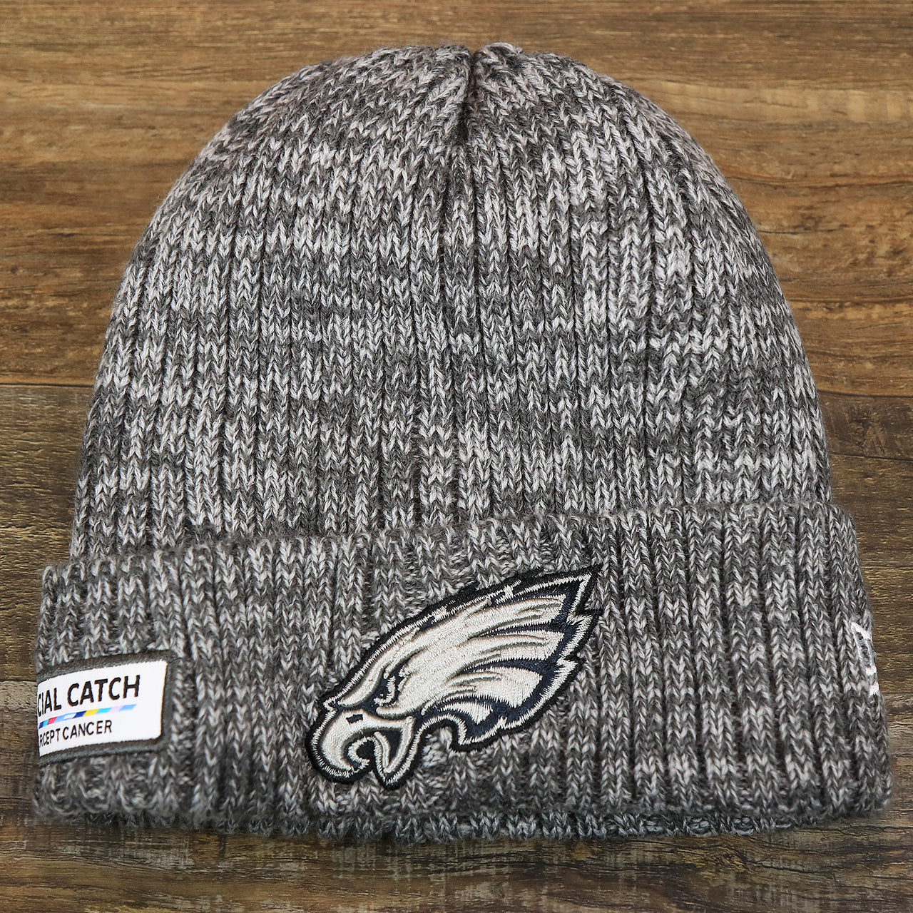 The front of the Philadelphia Eagles On Field Crucial Catch Patch NFL Winter Beanie | Graphite Winter Beanie