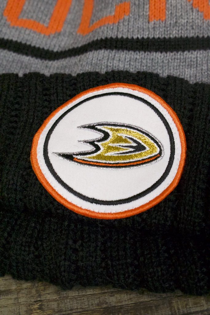 Ducks beanie | Anaheim Ducks Circle Patch Mitchell and Ness Multicolor Pom Knit Beanie