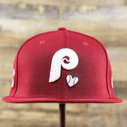 The front of the Cooperstown Philadelphia Phillies Baseball Heart Gray Bottom World Series 59Fifty Fitted Cap | Maroon 59Fifty Cap