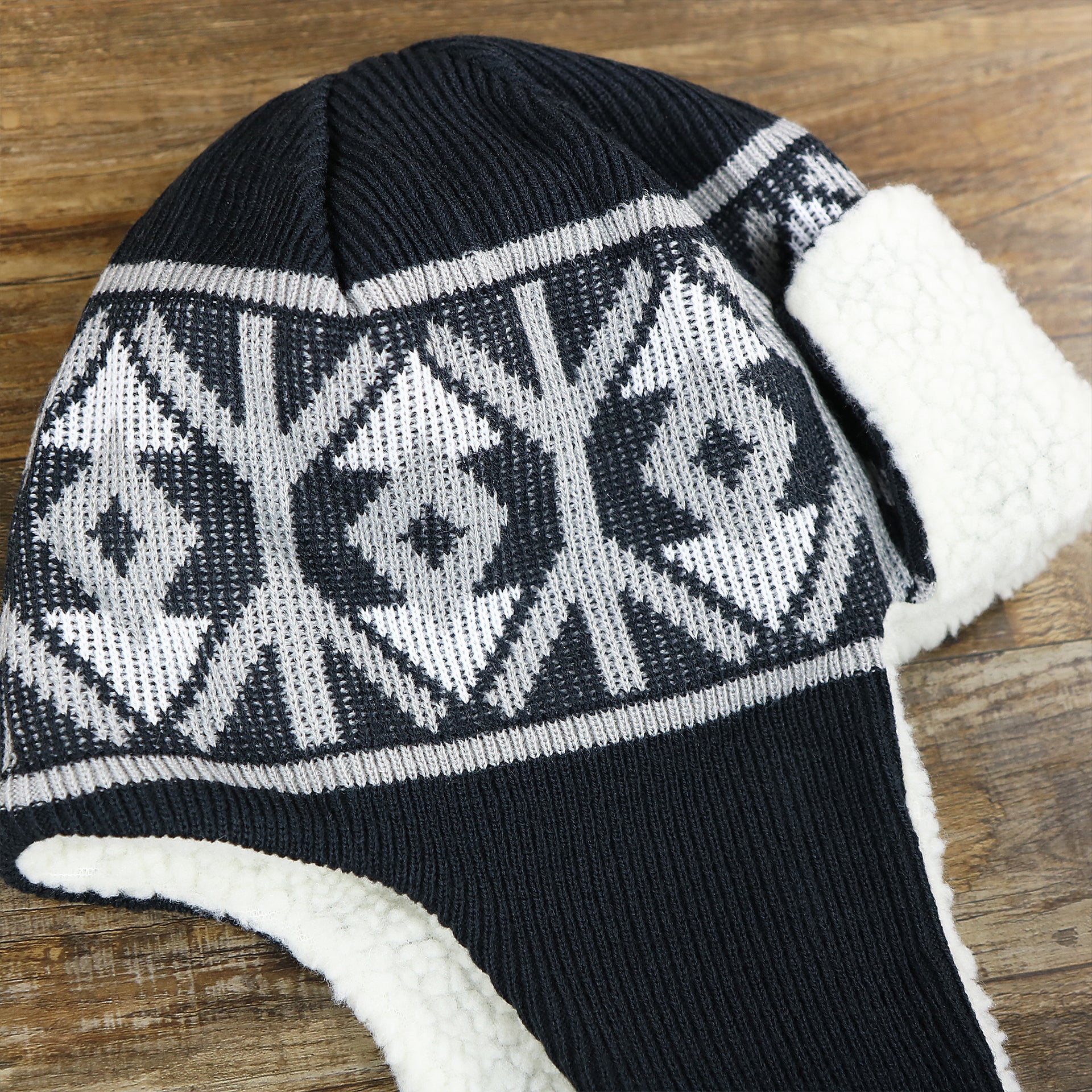 The New York Yankees Winter Print Trapper Hat | Navy Blue Trapper Hat  laying flat