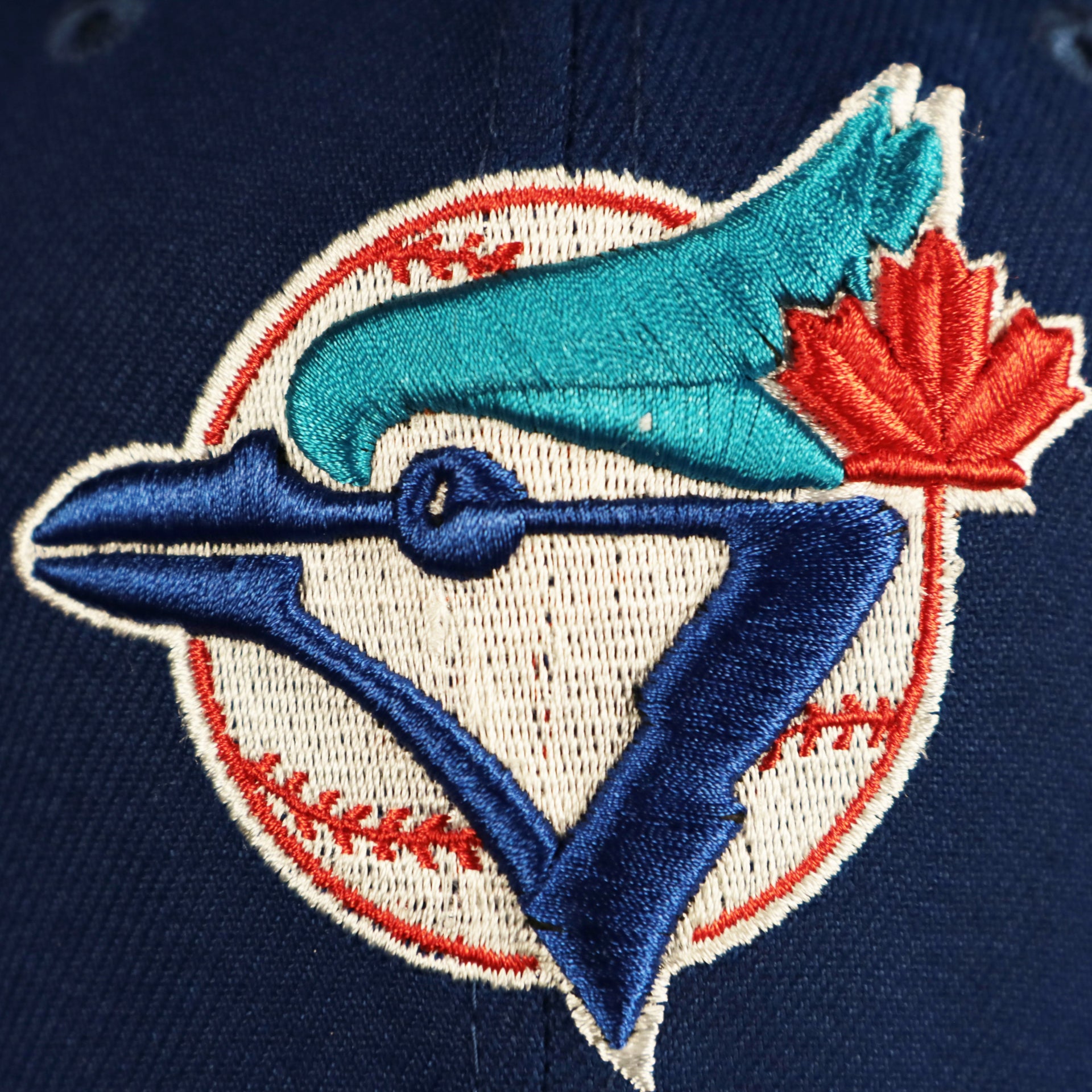 Close up of the Blue Jays logo on the Toronto Blue Jays "City Cluster" Side Patch Gray Bottom Royal 59Fifty Fitted Cap