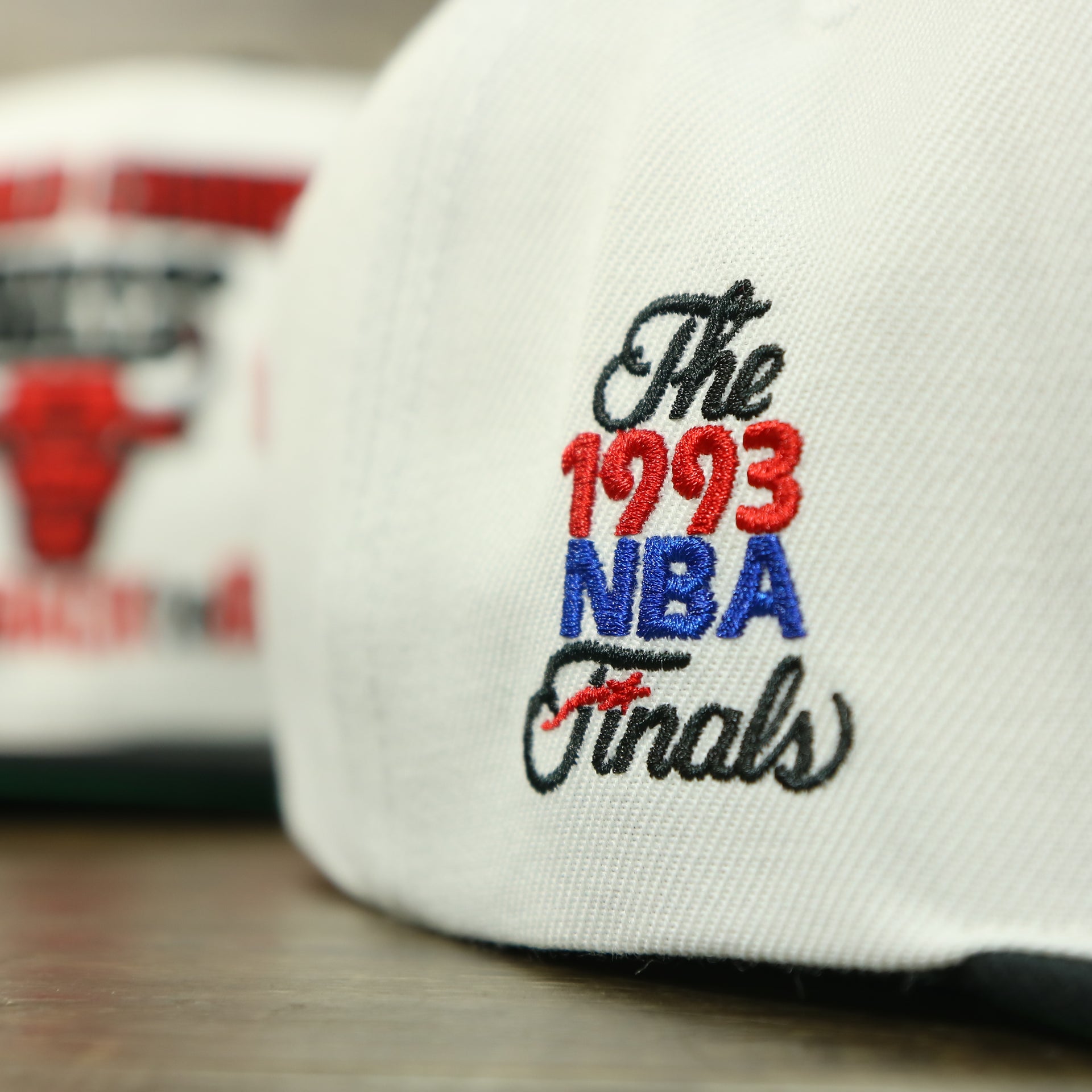 1993 nba finals logo on the side of the Chicago Bulls Vintage Retro NBA Champions 1993 Back To Back To Back Mitchell and Ness Snapback Hat | White