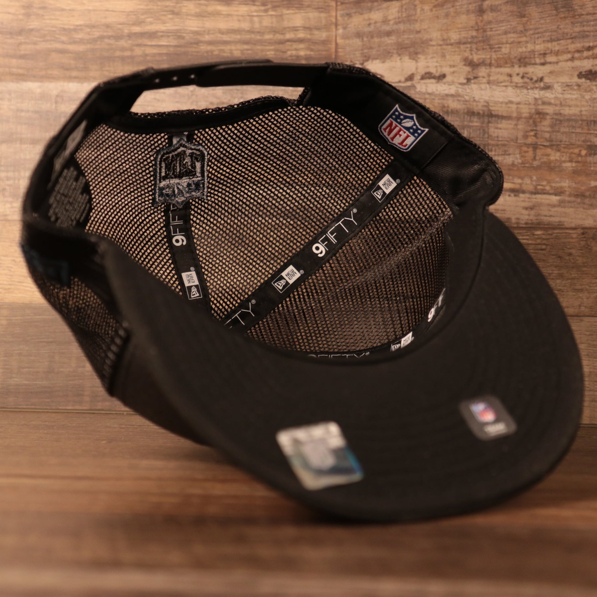 The black bottom brim of the meshback snapback hat of the Philadelphia Eagles for the 2021 NFL Draft.