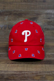 front of the Philadelphia Phillies All Over Bell Confetti Red Women's Dad Hat