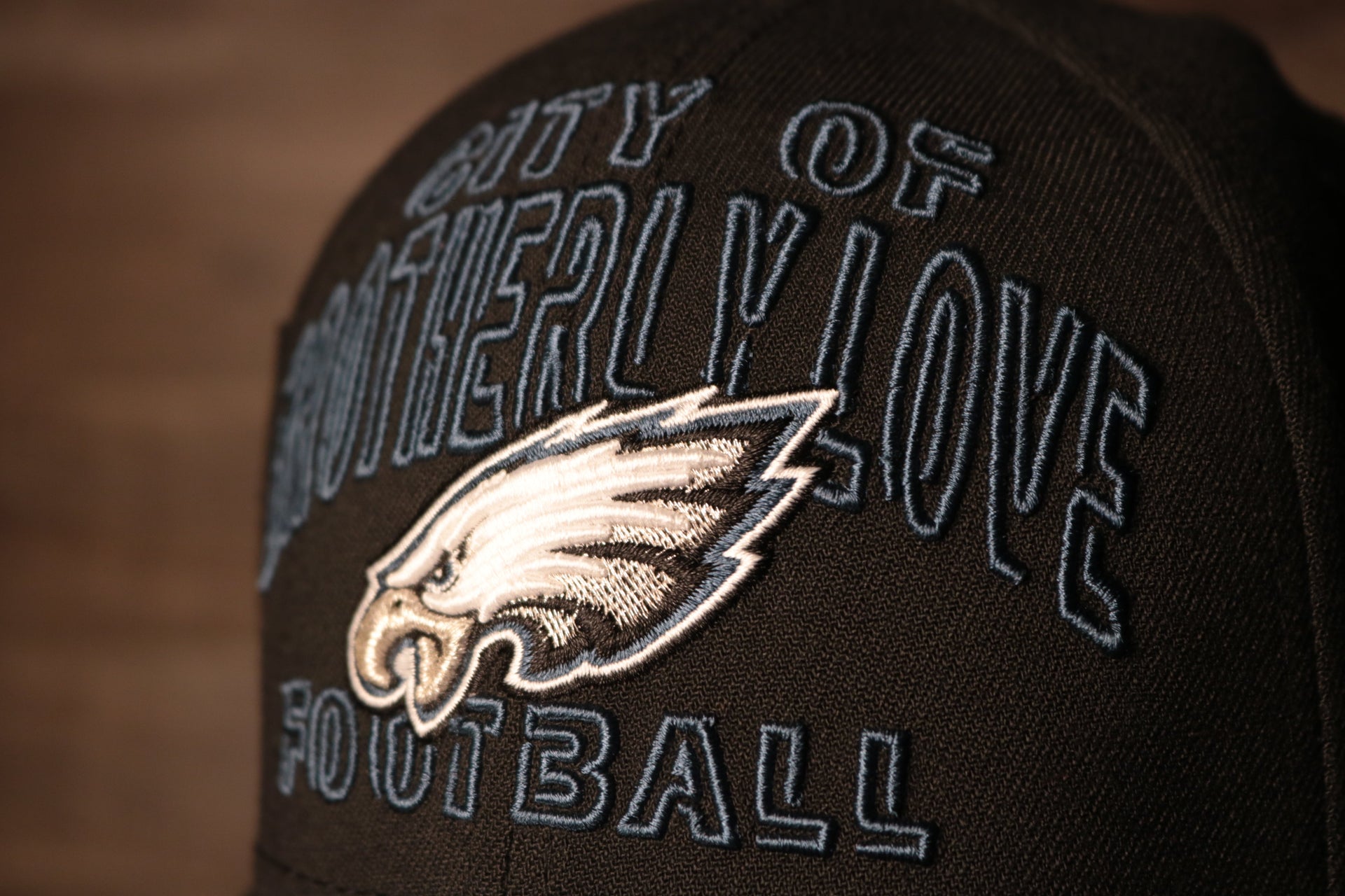 The words on the front are in green Eagles 2020 Draft Flexfit Hat | Philadelphia Eagles Alternate Draft Stretch Cap