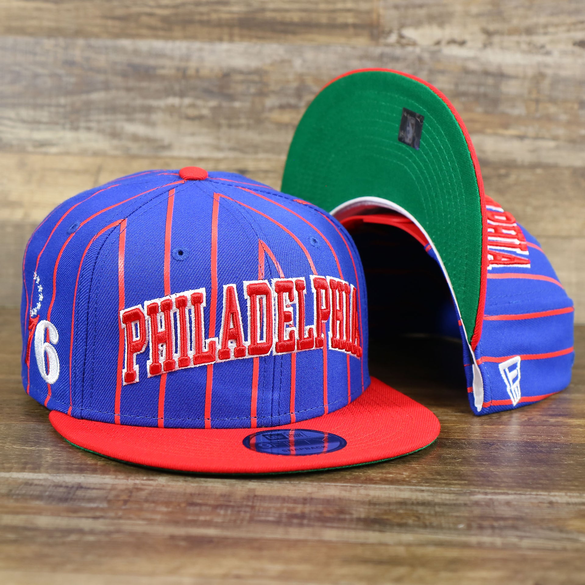 The Philadelphia 76ers City Arch Striped 9Fifty Snapback Cap | Royal Blue 9Fifty Cap