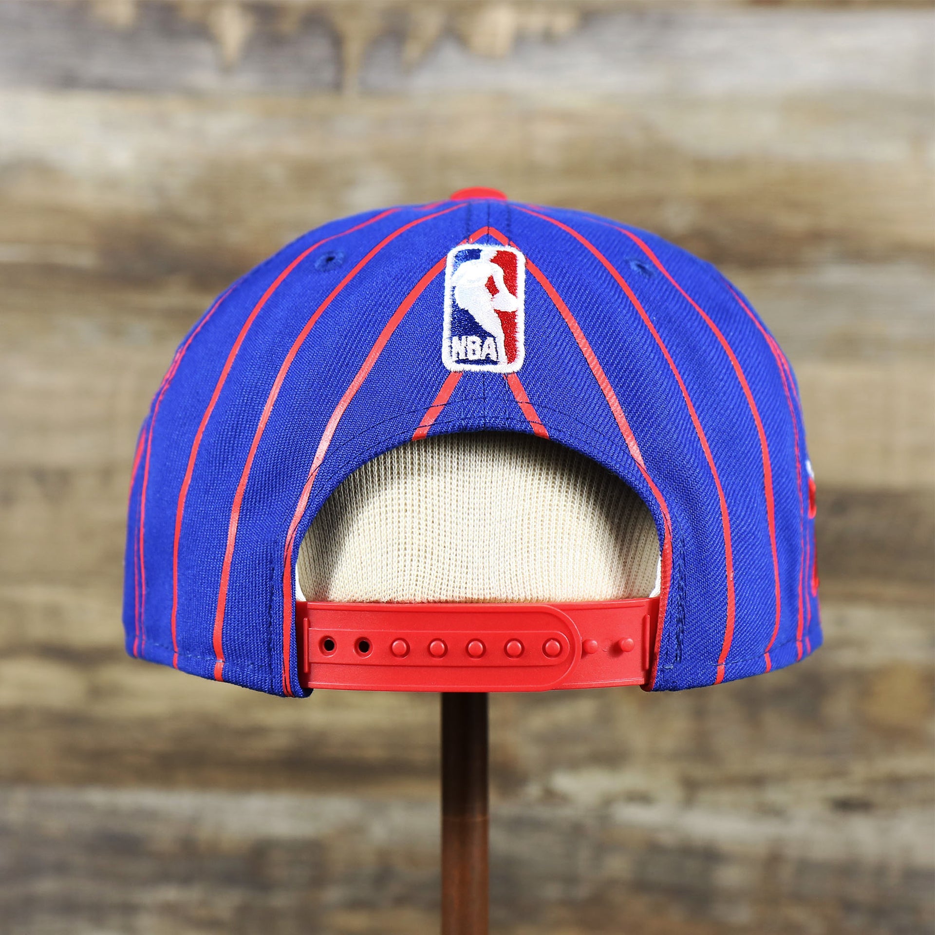 The backside of the Philadelphia 76ers City Arch Striped 9Fifty Snapback Cap | Royal Blue 9Fifty Cap