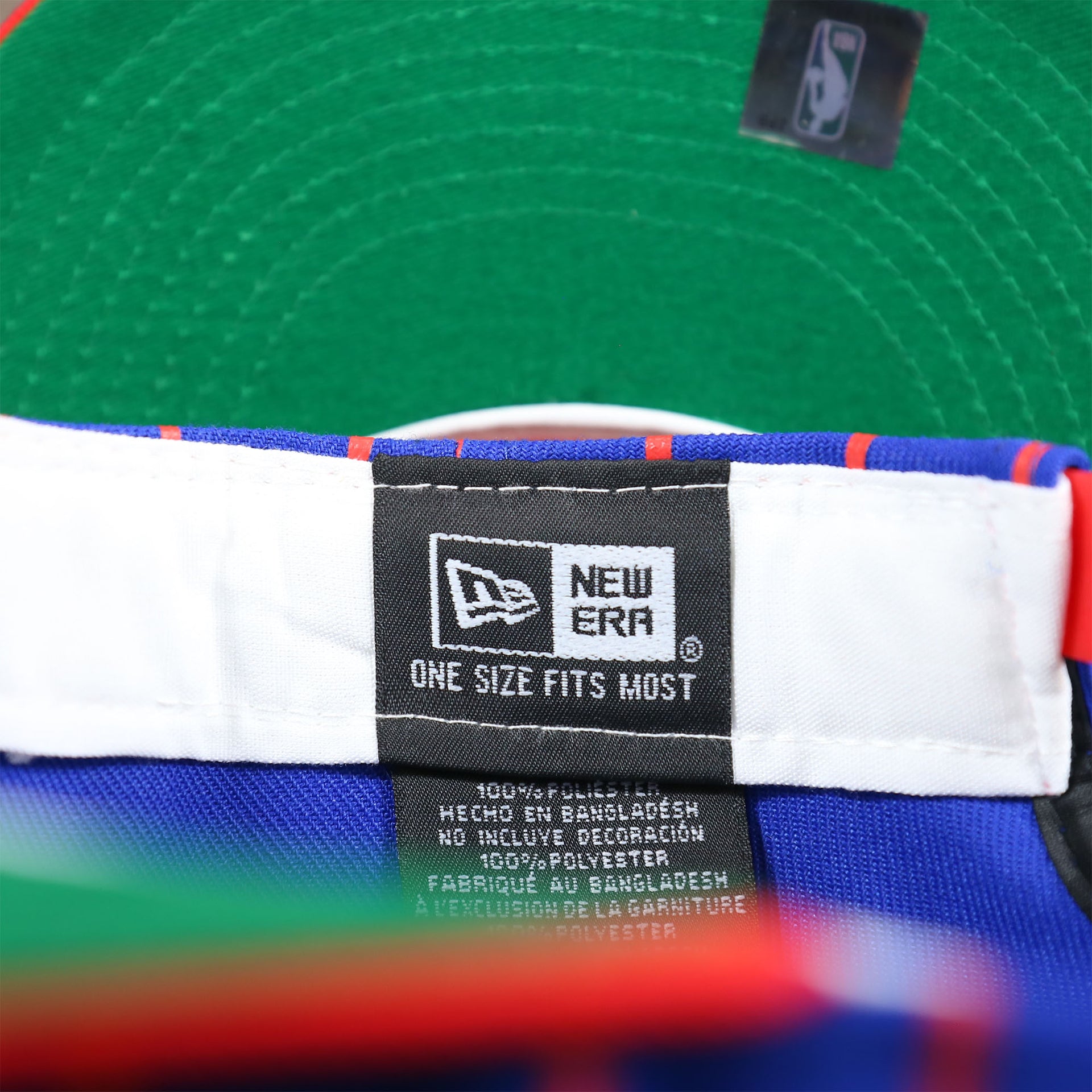 The New Era Tag on the Philadelphia 76ers City Arch Striped 9Fifty Snapback Cap | Royal Blue 9Fifty Cap