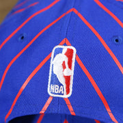 The NBA Jerrywest Logo on the Philadelphia 76ers City Arch Striped 9Fifty Snapback Cap | Royal Blue 9Fifty Cap