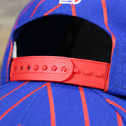 The Red Adjustable Strap on the Philadelphia 76ers City Arch Striped 9Fifty Snapback Cap | Royal Blue 9Fifty Cap