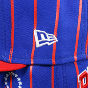 The New Era Logo on the Philadelphia 76ers City Arch Striped 9Fifty Snapback Cap | Royal Blue 9Fifty Cap