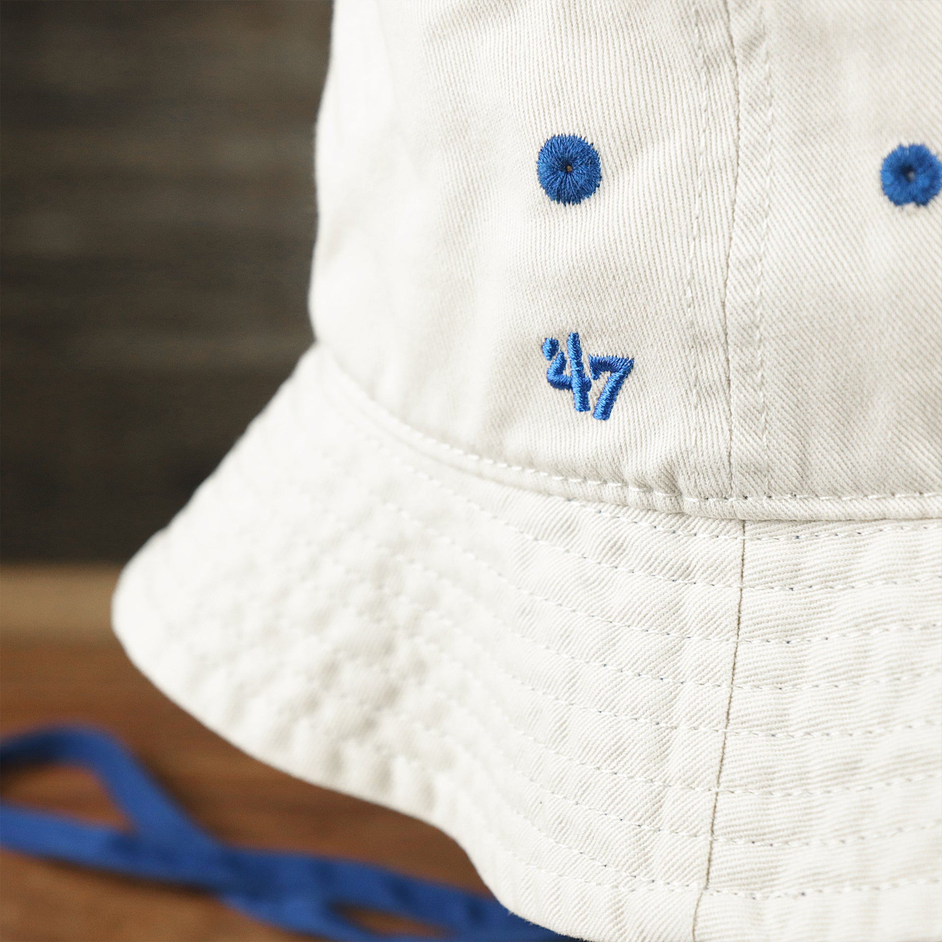 The 47 Brand Logo on the Philadelphia 76ers Logo Royal Blue Undervisor Bucket Hat | Natural Bucket Hat