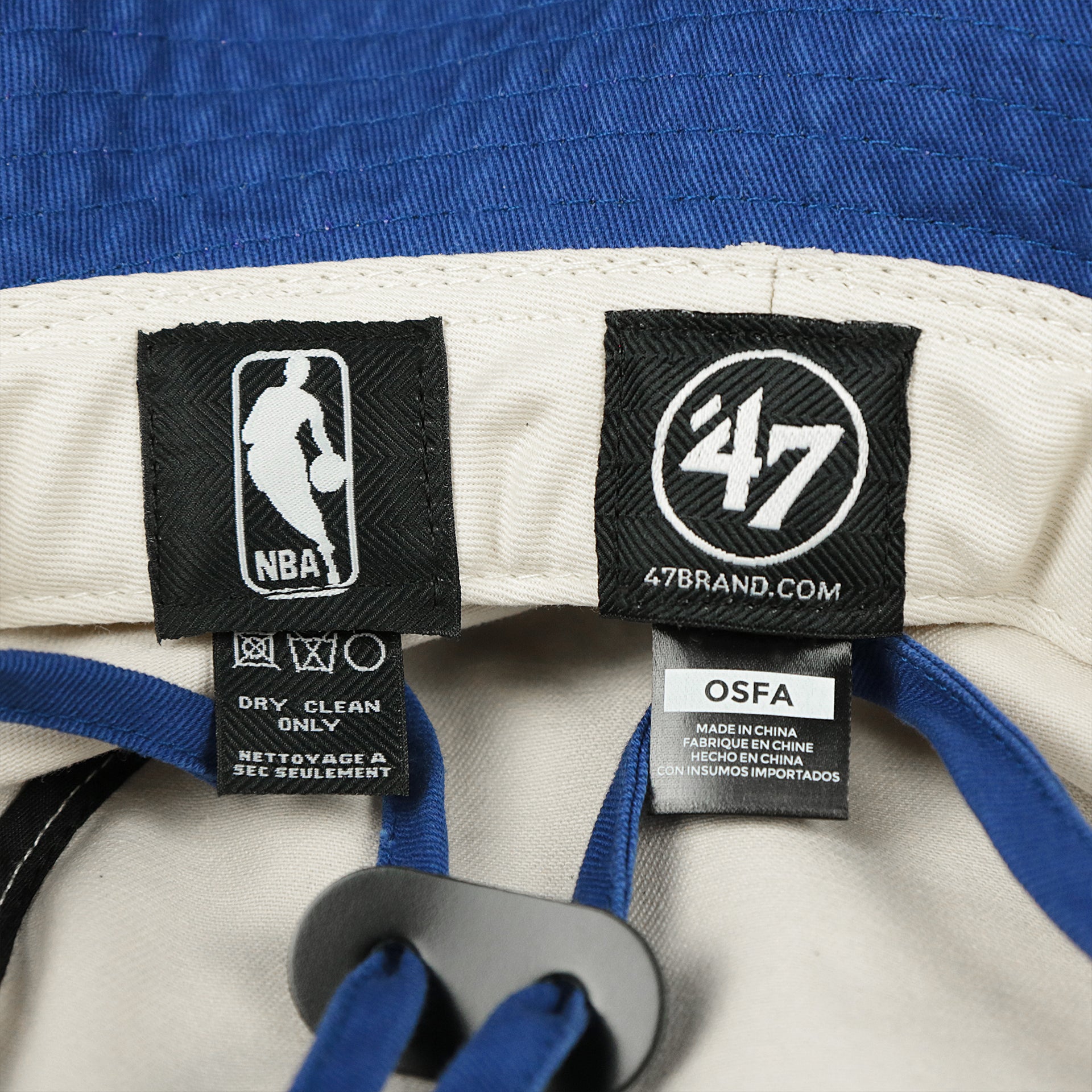 The Tags on the Philadelphia 76ers Logo Royal Blue Undervisor Bucket Hat | Natural Bucket Hat