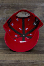 underside of the Philadelphia Phillies All Over Bell Confetti Red Women's Dad Hat