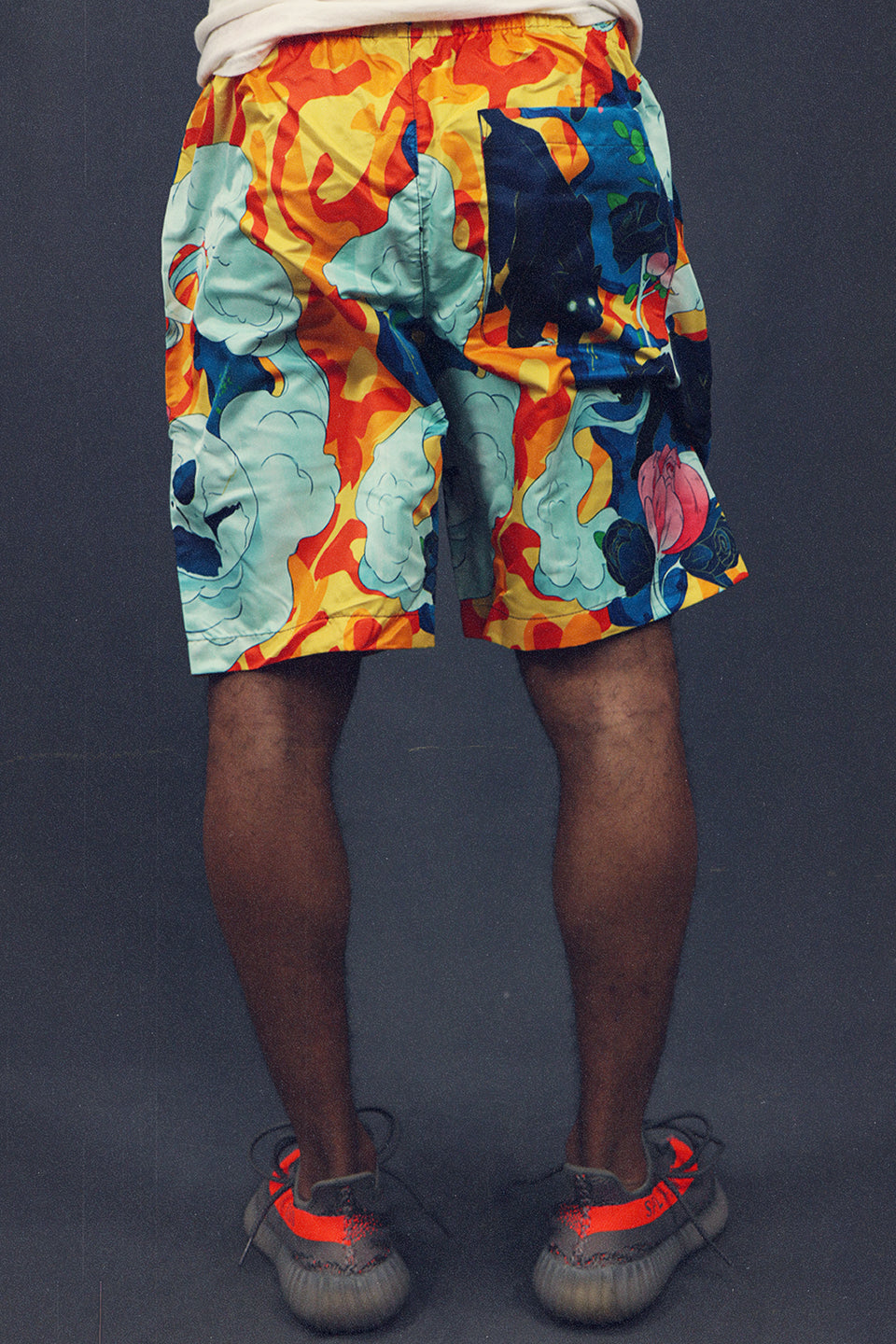 back shot of the Men’s Sunshine Surf Trunks Board Shorts To Match Sneakers | Orange and Teal