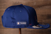 Giants 2020 Training Camp Snapback Hat | New York Giants 2020 On-Field Red Training Camp Snap Cap on the wearers right side is the training camp logo