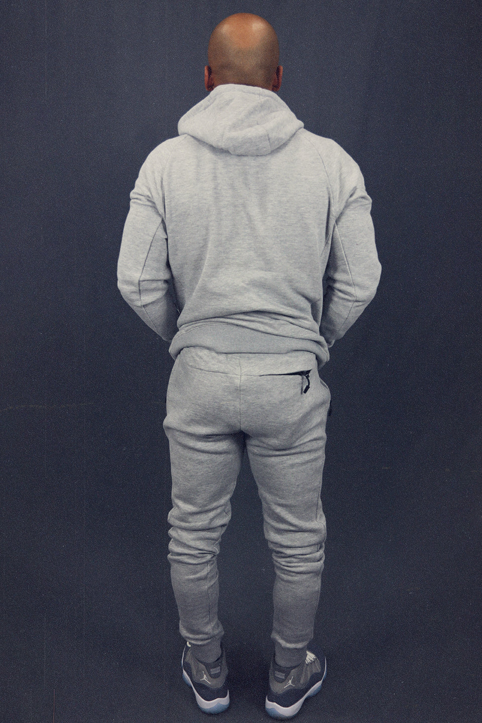 back view of the matching set Men's Heather Grey Fleece Sweatpants Jogger Pants Bottom To Match Sneakers