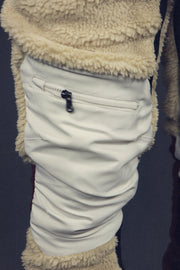 zipper on the knee of the Foliage Sherpa Tech Pants With Zipper Pockets For Sherpa Two Piece Set To Match Sneakers