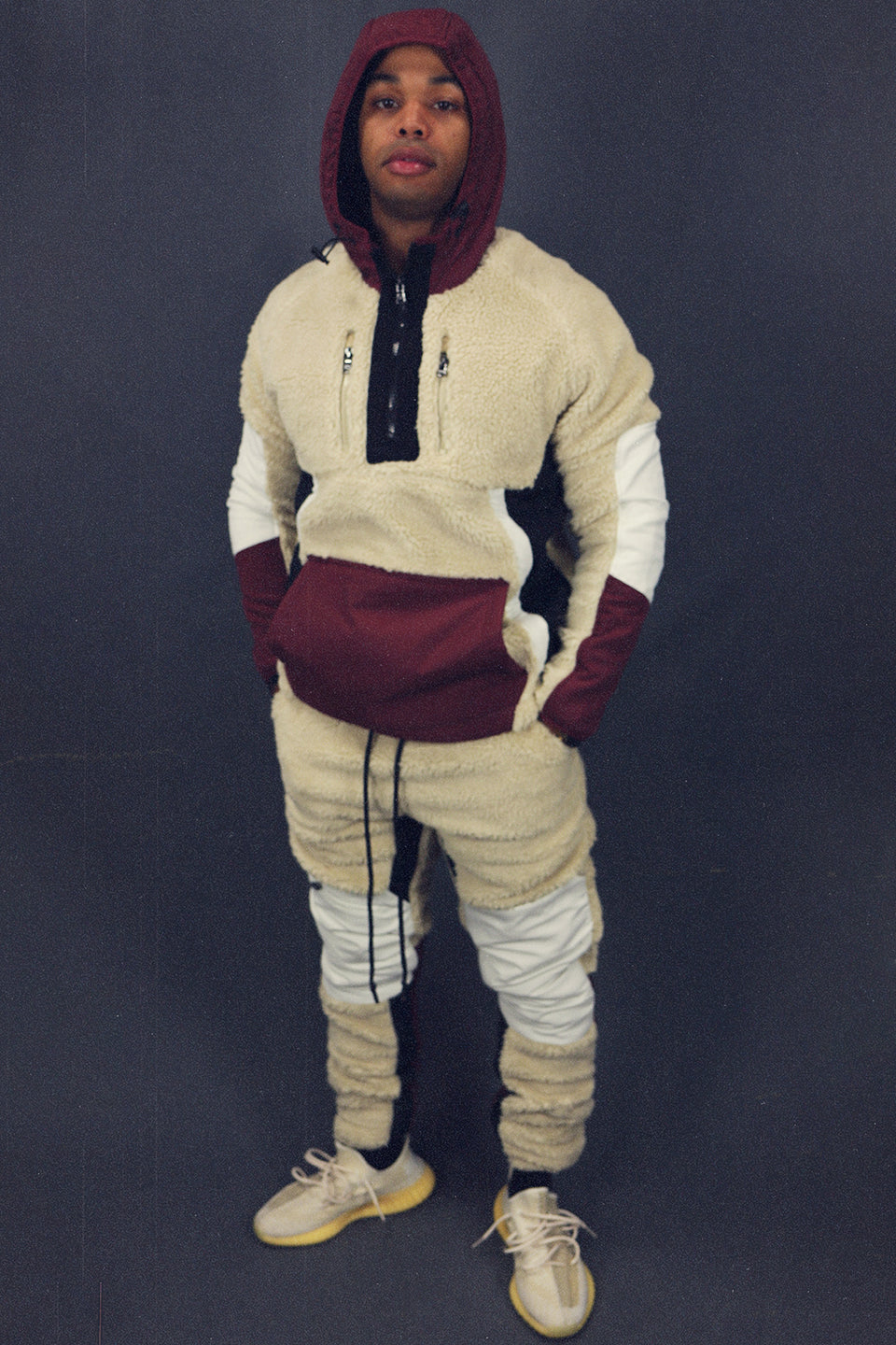front view of the Foliage Sherpa Tech Pull Over Jacket With Full Front Pocket For Sherpa Two Piece Set To Match Sneakers