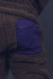 back pocket of the Mocha Sherpa Tech Pants With Zipper Pockets For Sherpa Two Piece Set To Match Sneakers