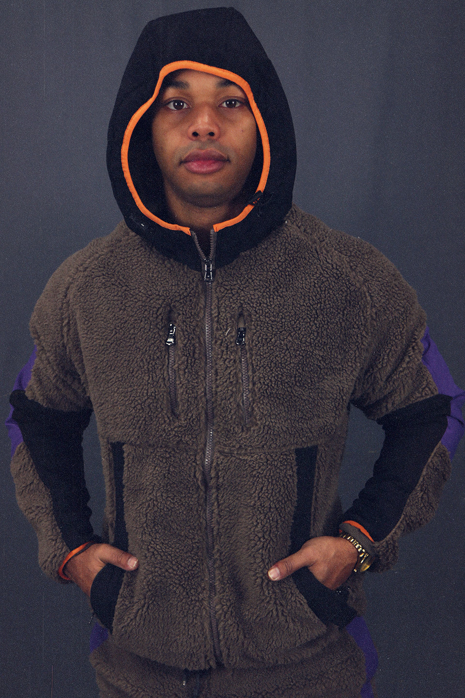 front with hood on the Mocha Sherpa Tech Jacket With Zipper Pockets For Sherpa Two Piece Set To Match Sneakers