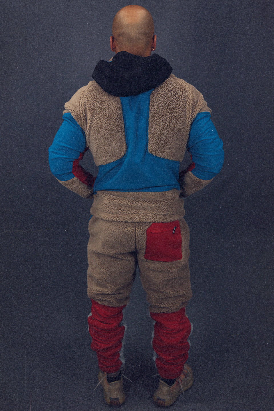 back of the matching Earth Sherpa Tech Jacket With Zipper Pockets For Sherpa Two Piece Set To Match Sneakers