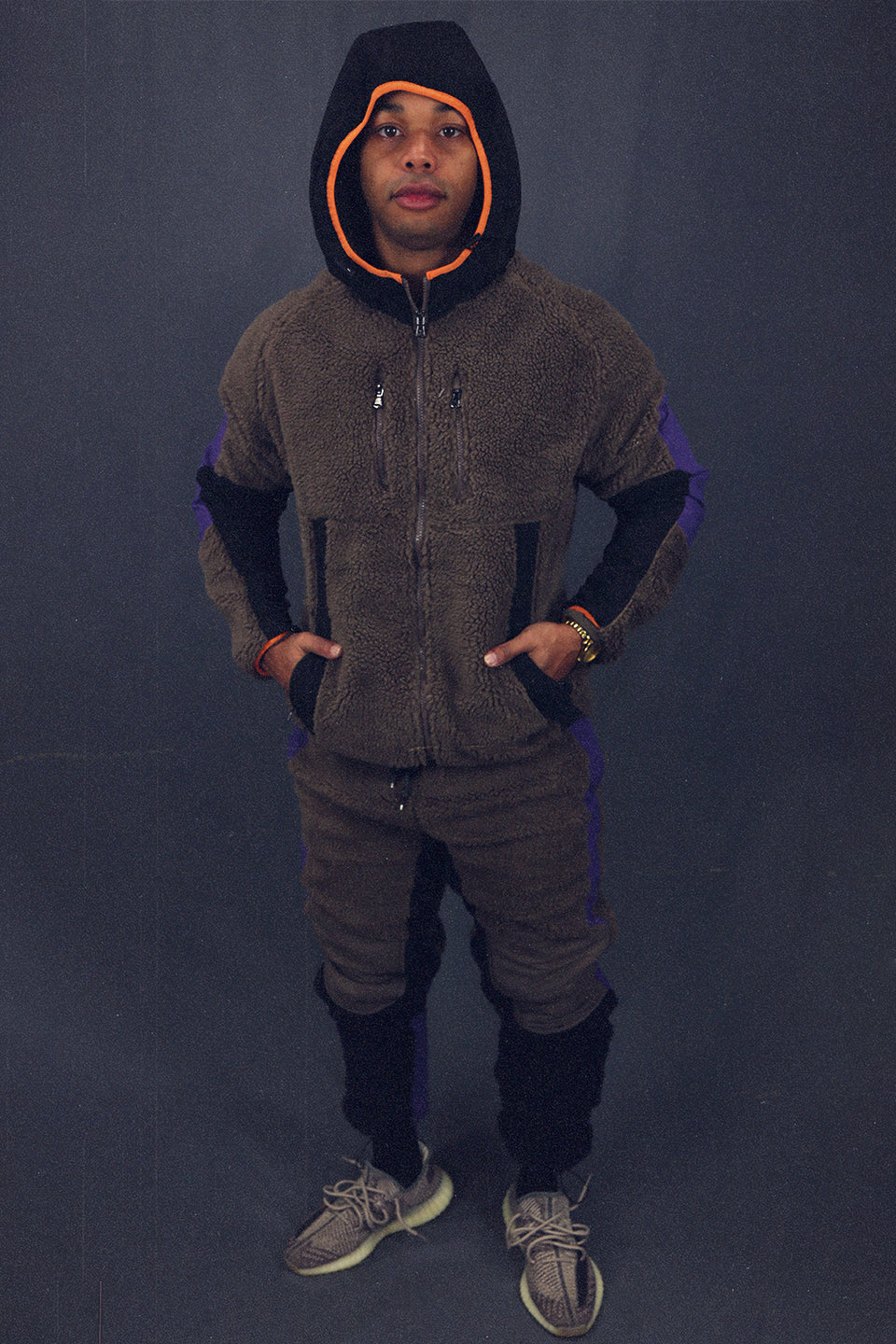 matching front of the Mocha Sherpa Tech Jacket With Zipper Pockets For Sherpa Two Piece Set To Match Sneakers