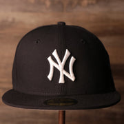 Yankees On-Field Grey Bottom Fitted Cap | New York Yankees 2000 Game Worn World Series Side Patch Gray Under Brim 59Fifty Fitted Hat the front of this yankees 2000 world series grey bottom fitted has the classic yankees logo
