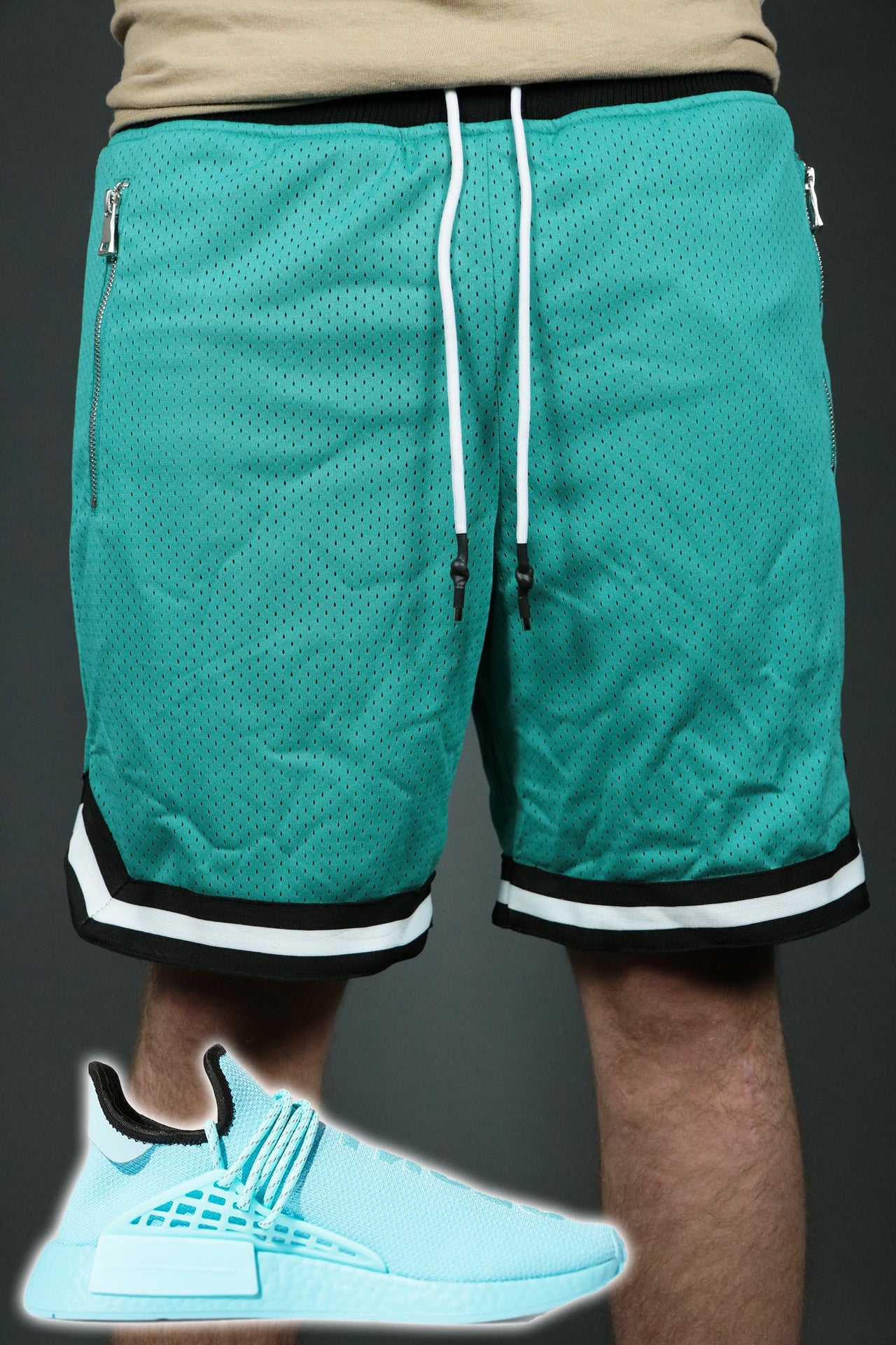 The retro San Antonio aqua shorts to match Pharell x NMD Hu sneakers by Jordan Craig.