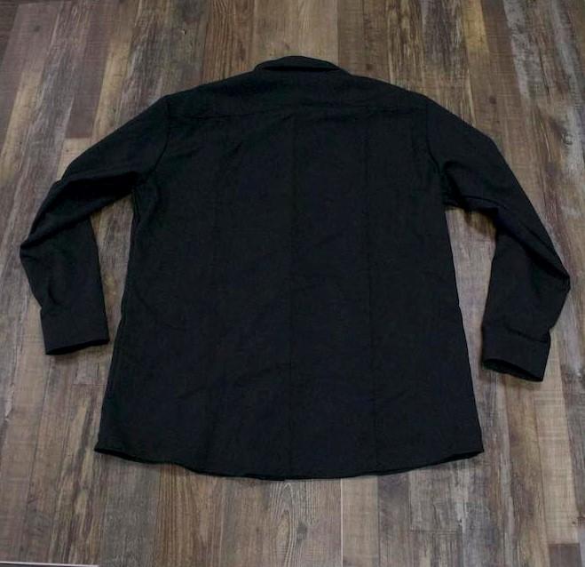 the back of the Police | Black LAPD Long Sleeve Polo Shirt | Wool Base Shirt for Law Enforcement Uniforms is a plain polo shirt