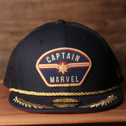 Captain Marvel Red Bottom Snapback | Captain Marvel Navy Trucker Red Bottom Snap Cap the front of this captain marvel snapback has the captain marvel logo on it with a navy blue crown
