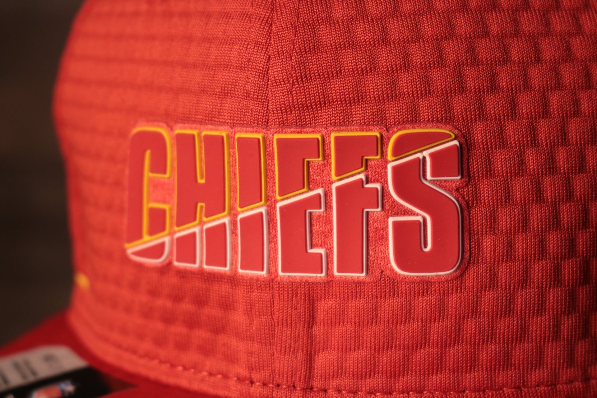 Chiefs 2020 Training Camp Snapback Hat | Kansas City Chiefs 2020 On-Field Red Training Camp Snap Cap the chiefs logo is red with an outline of yellow and white