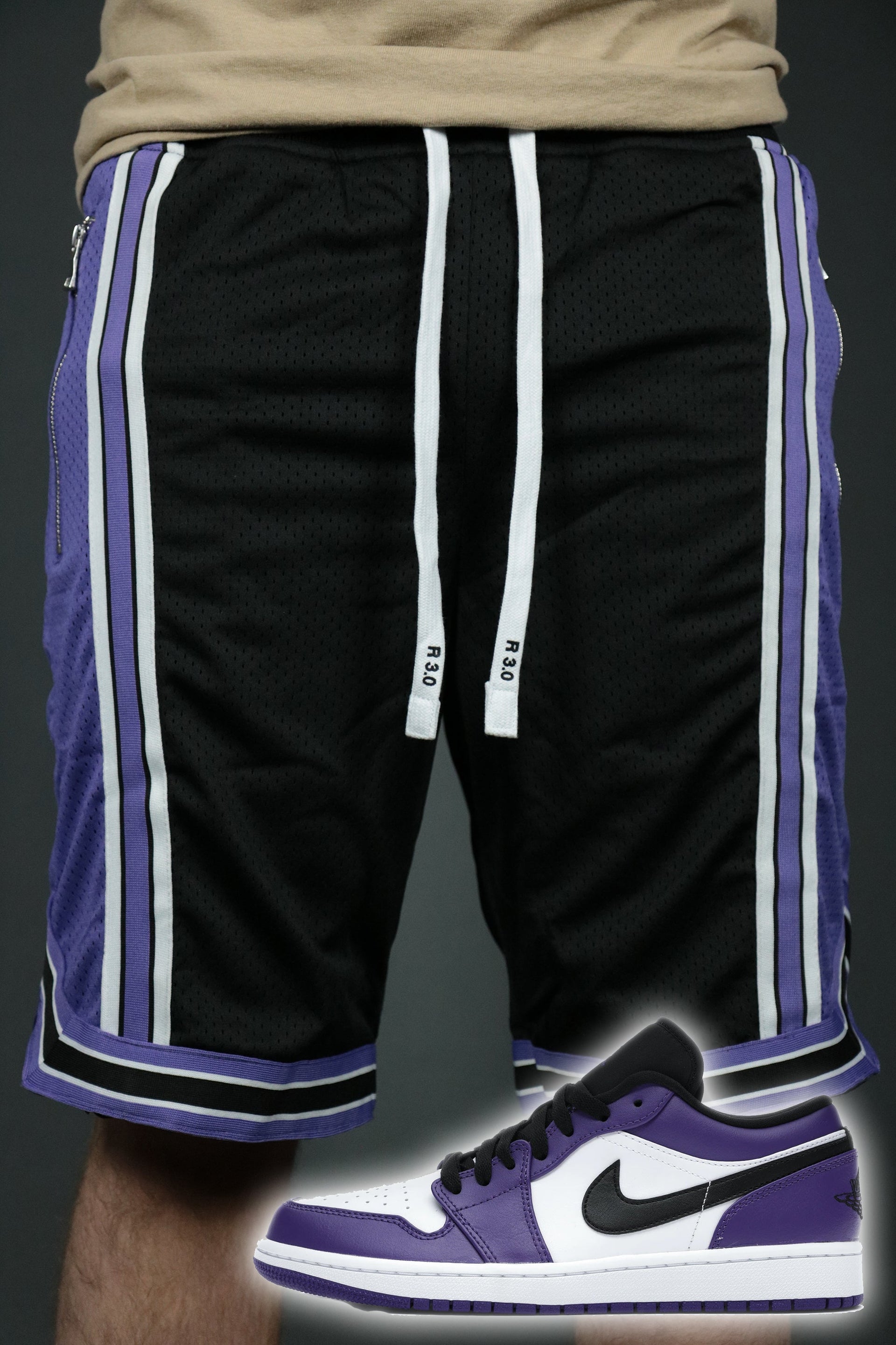 The Sacramento black purple shorts to match Jordan 1 Low Court Purple sneakers with white stripes.