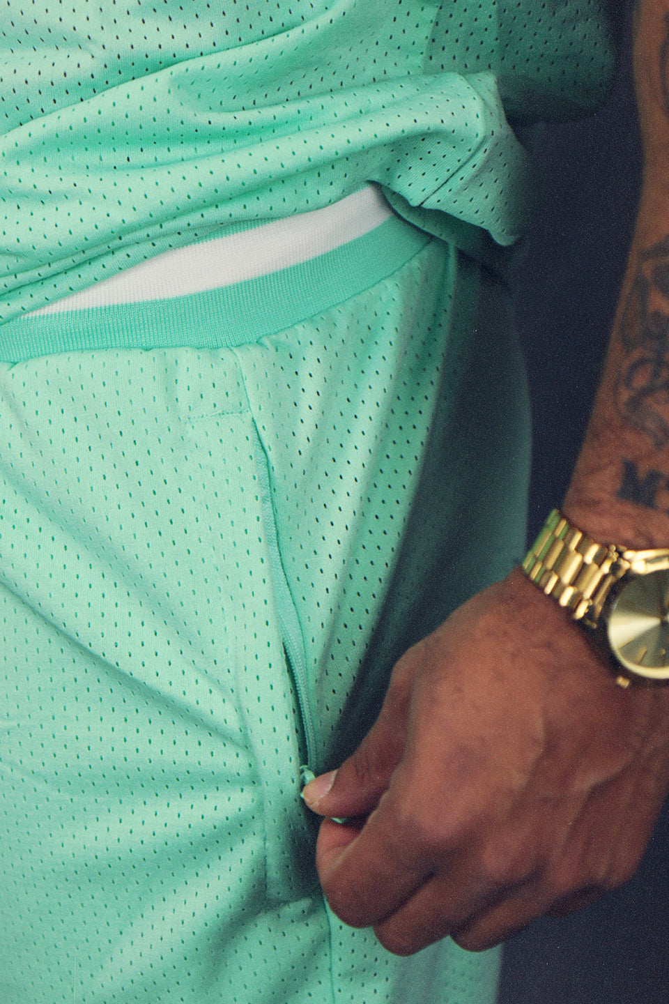 Side view of the Men's Hooper Basketball Workout Mint Mesh Retro Shorts