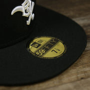 The 59Fifty Sticker on the Chicago White Sox Alpha Industries Side Patch Army Green Undervisor 59FIfty Fitted Cap With Hangtag | Black 59FIfty Cap