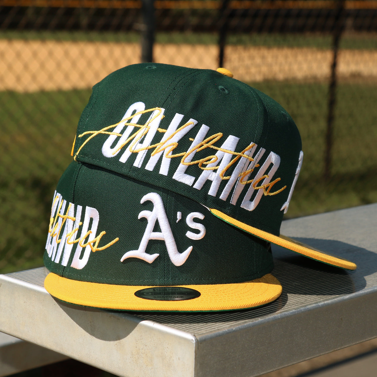 The front of the Oakland Athletics MLB Side Font Green Bottom 9Fifty Snapback Cap | Black Snap Cap